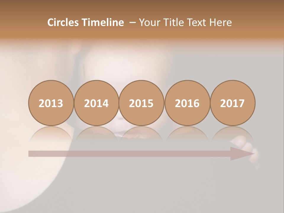 A Man Holding A Baby In His Arms PowerPoint Template