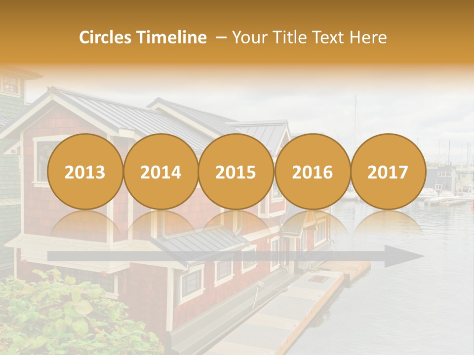 A Row Of Houses Sitting Next To A Body Of Water PowerPoint Template