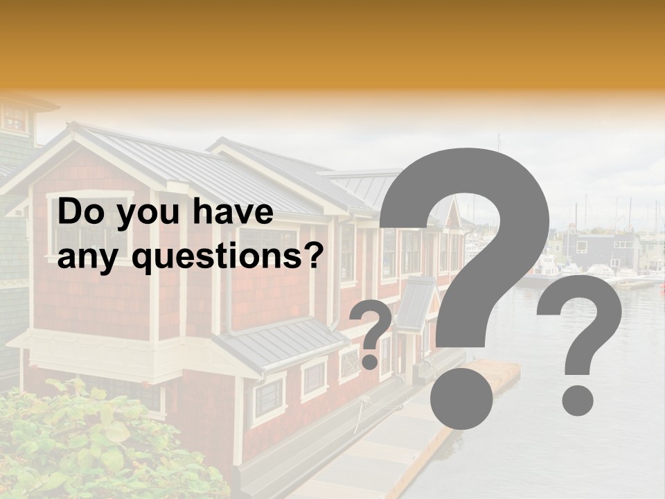 A Row Of Houses Sitting Next To A Body Of Water PowerPoint Template