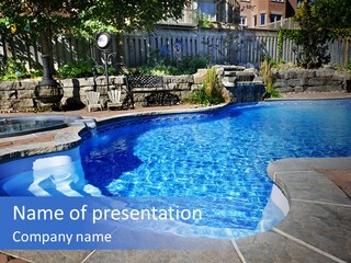 A Large Swimming Pool With A Waterfall In The Middle Of It PowerPoint Template