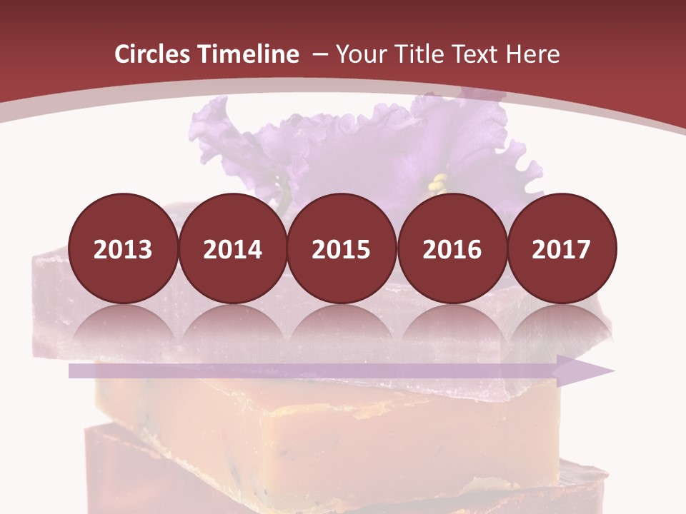 Three Soap Bars With A Purple Flower On Top Of Them PowerPoint Template