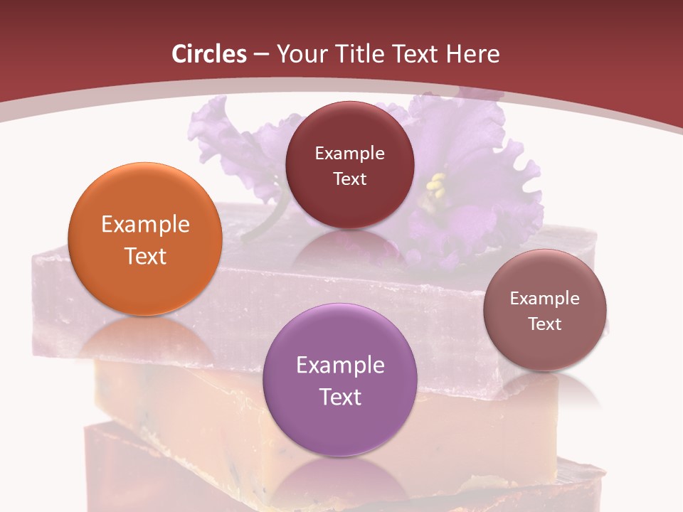 Three Soap Bars With A Purple Flower On Top Of Them PowerPoint Template