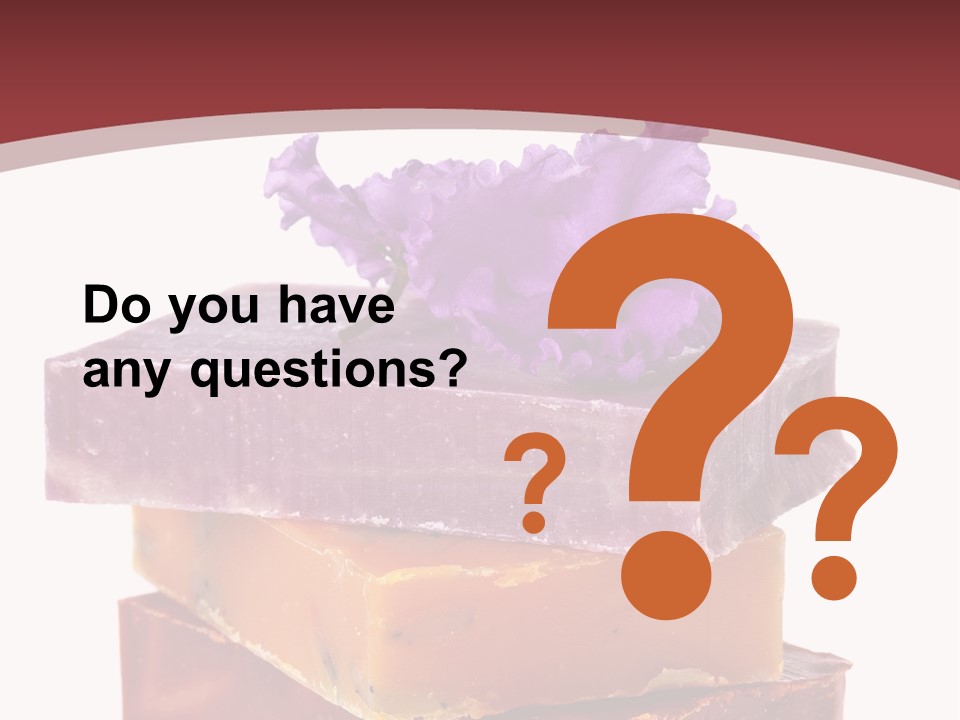 Three Soap Bars With A Purple Flower On Top Of Them PowerPoint Template