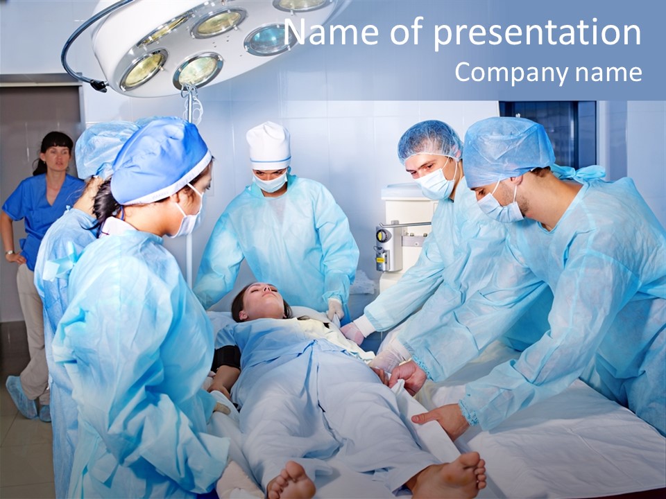 A Group Of Doctors Performing Surgery In A Hospital PowerPoint Template