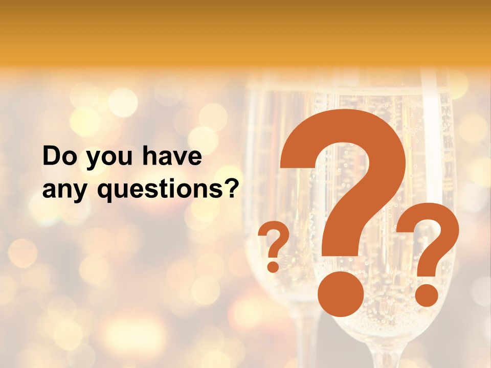 Two Glasses Of Champagne On A Table With A Gold Background PowerPoint Template