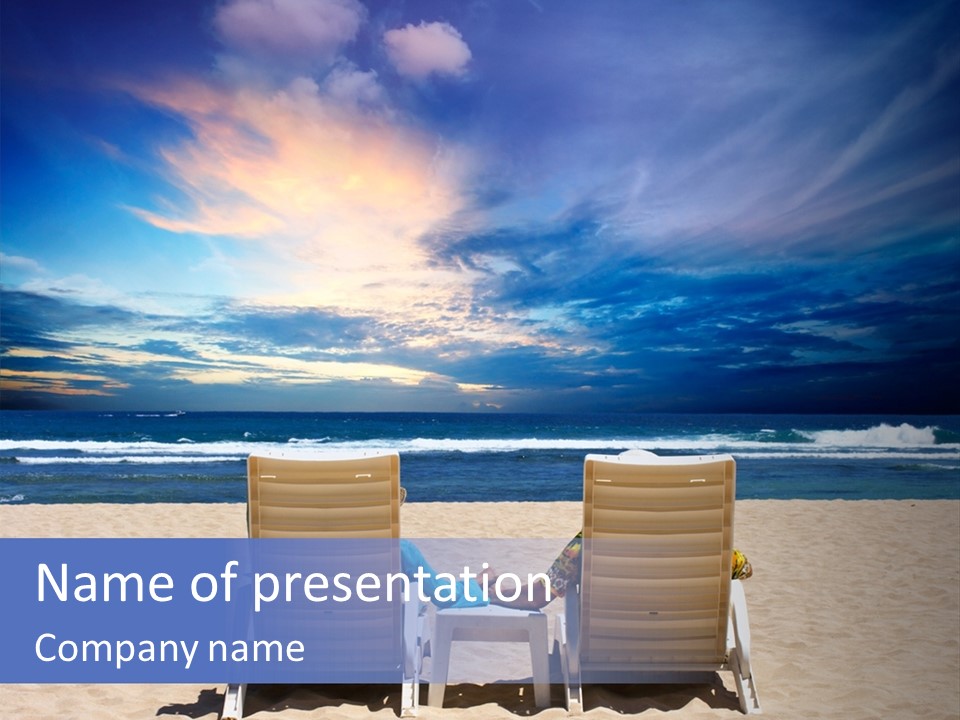 Two Chairs Sitting On A Beach Facing The Ocean PowerPoint Template