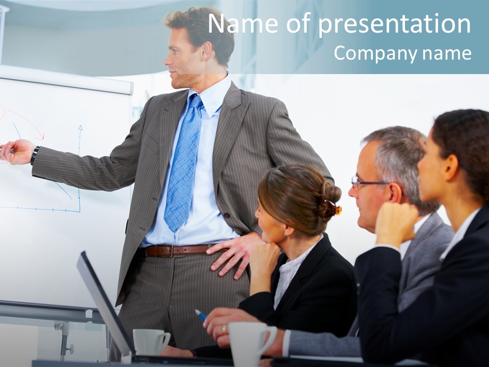 A Man Giving A Presentation To A Group Of Business People PowerPoint Template