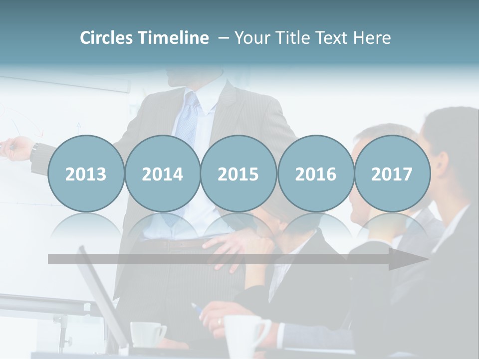 A Man Giving A Presentation To A Group Of Business People PowerPoint Template