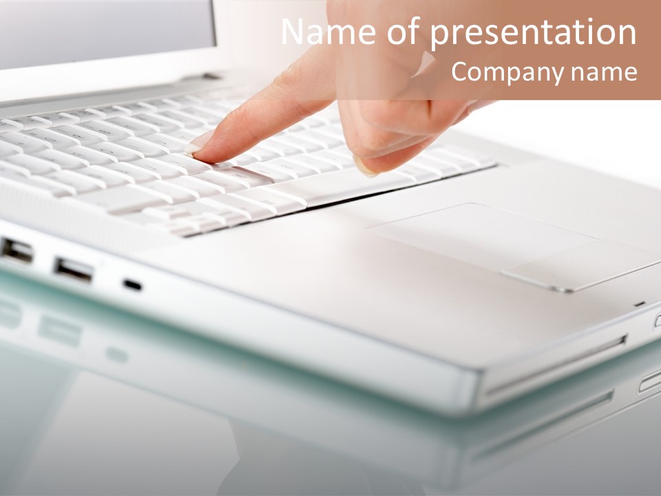 A Person Touching The Keyboard Of A Laptop PowerPoint Template