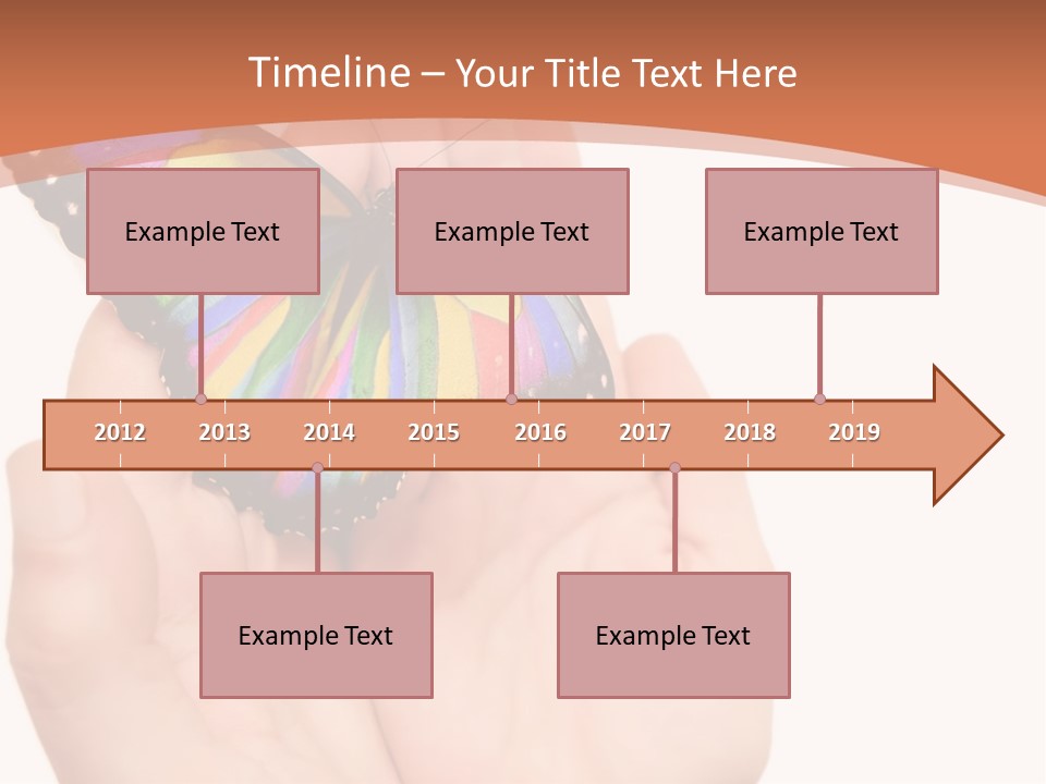 A Person Holding A Colorful Butterfly In Their Hands PowerPoint Template