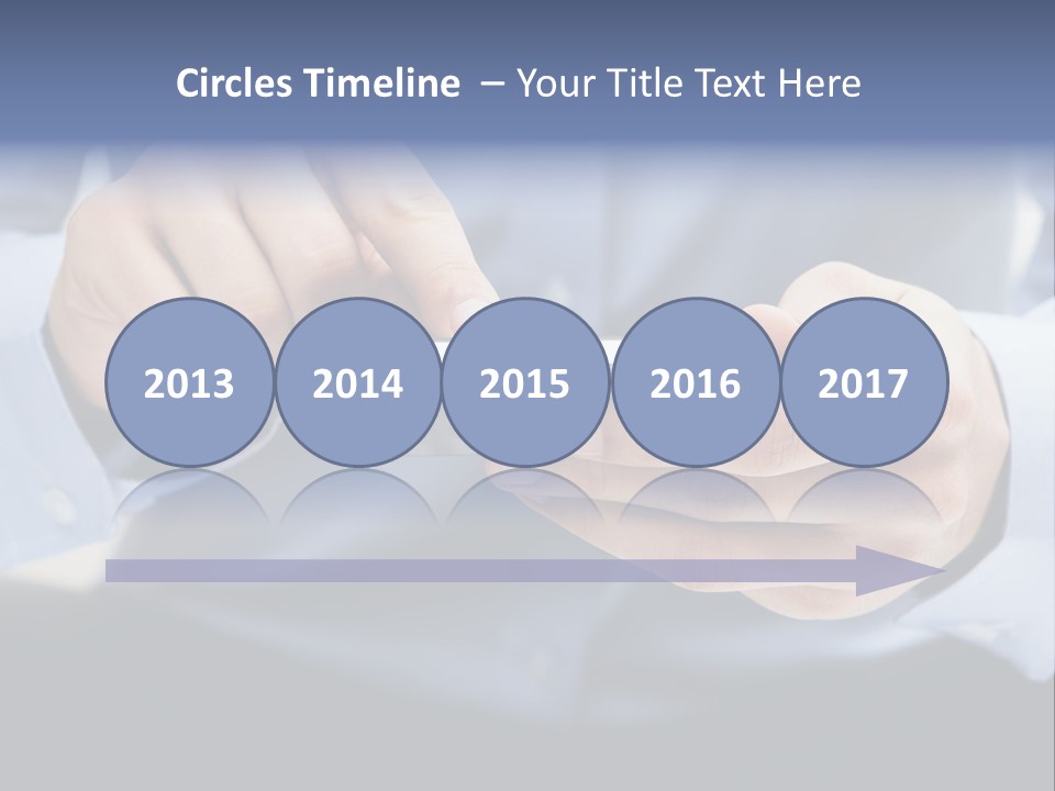 A Man Holding A Cell Phone In His Hand PowerPoint Template