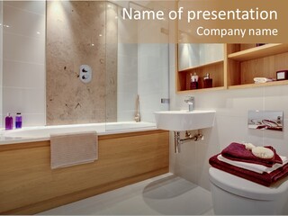A Bath Room With A Toilet A Sink And A Bath Tub PowerPoint Template
