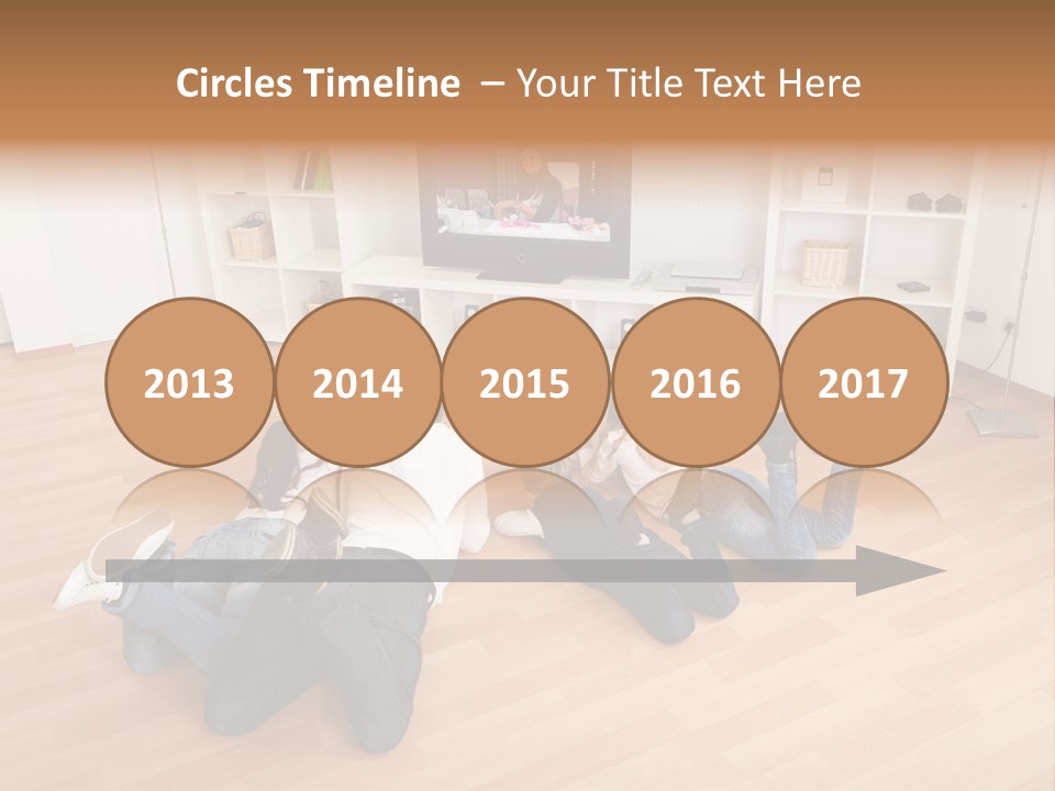 A Group Of People Sitting On The Floor Watching Tv PowerPoint Template