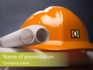 A Hard Hat And A Pair Of Ear Buds On A Table PowerPoint Template