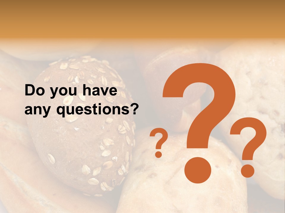 A Bunch Of Breads And Rolls On A Plate PowerPoint Template