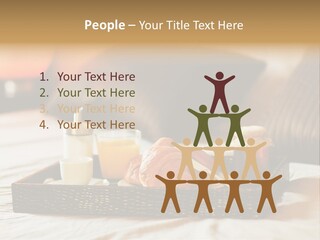 A Tray Of Breakfast Food On A Bed PowerPoint Template