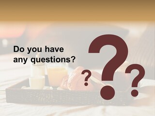 A Tray Of Breakfast Food On A Bed PowerPoint Template