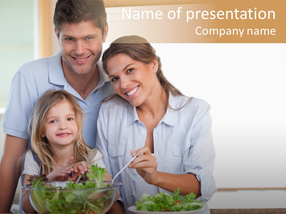 A Man And Woman With A Child Eating Salad PowerPoint Template