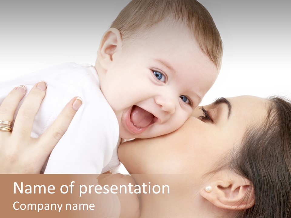 A Woman Holding A Baby In Her Arms PowerPoint Template