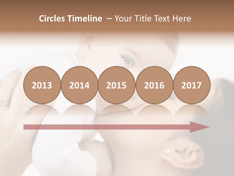 A Woman Holding A Baby In Her Arms PowerPoint Template