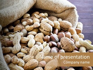 A Sack Full Of Nuts On A Wooden Table PowerPoint Template
