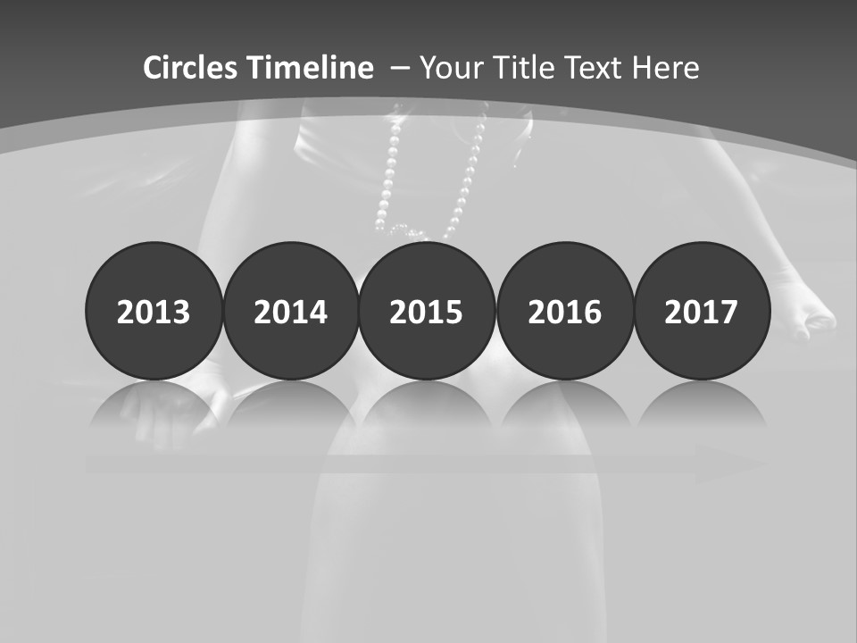 A Woman Sitting On A Couch In A Black And White Photo PowerPoint Template