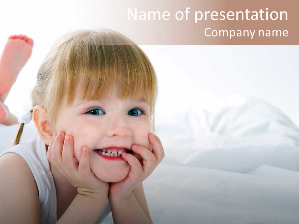 A Little Girl Laying On A Bed With Her Hands On Her Face PowerPoint Template