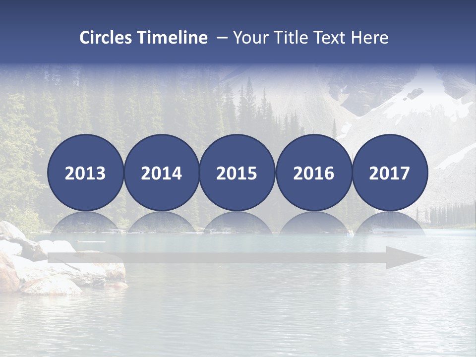 A Mountain Lake Surrounded By Pine Trees With A Blue Sky PowerPoint Template