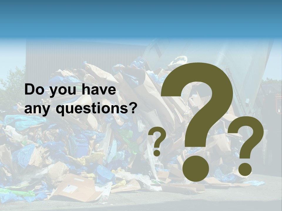 A Large Pile Of Garbage Sitting In Front Of A Building PowerPoint Template