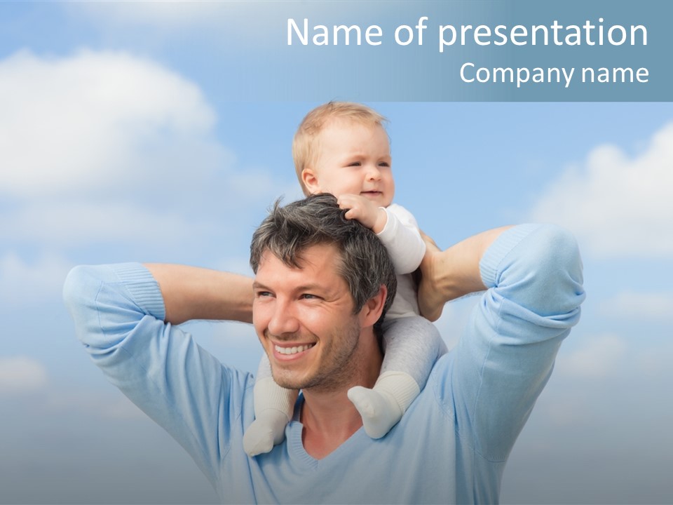 A Man Holding A Small Child On His Shoulders PowerPoint Template