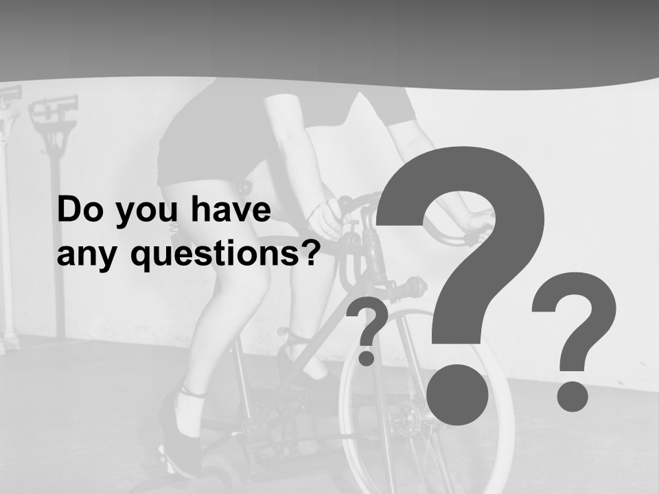 A Woman Riding A Bike In A Room PowerPoint Template