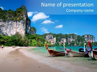 A Group Of Boats Sitting On Top Of A Sandy Beach PowerPoint Template