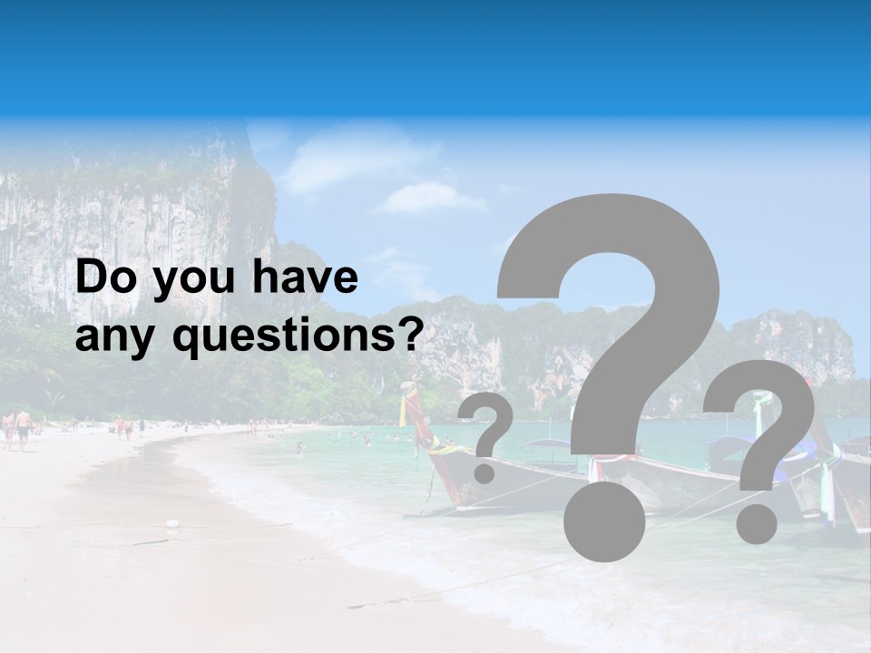 A Group Of Boats Sitting On Top Of A Sandy Beach PowerPoint Template