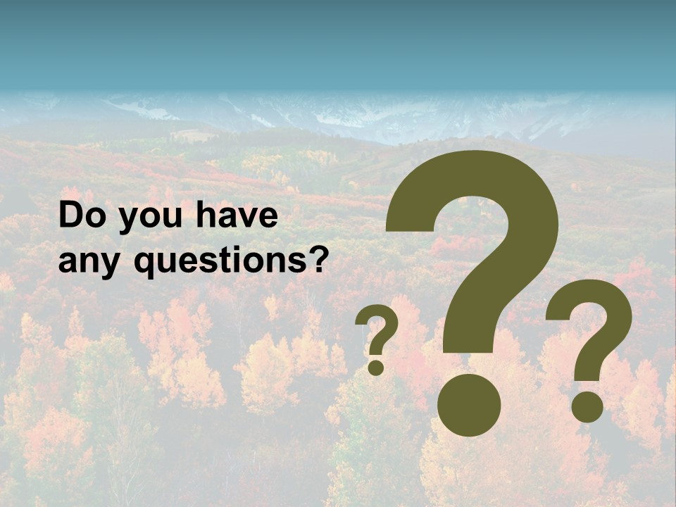 A Scenic View Of A Mountain Range With Colorful Trees PowerPoint Template