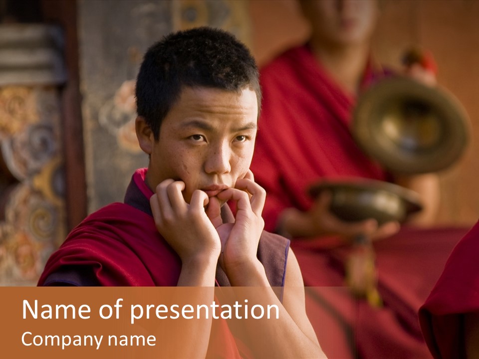A Man In A Red Robe Is Holding His Hands To His Face PowerPoint Template