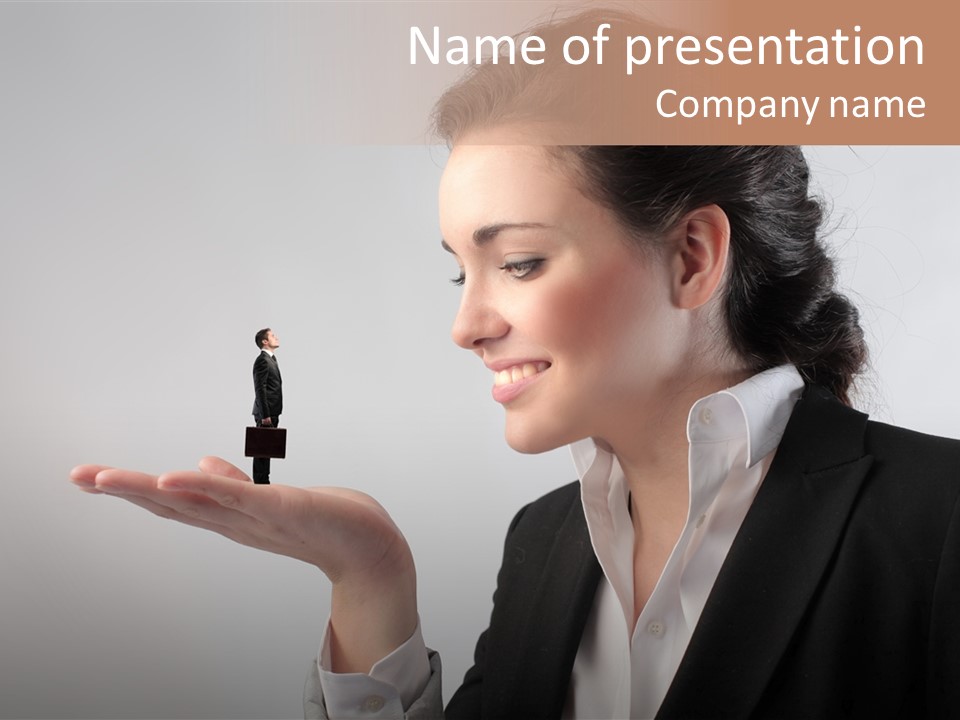 A Woman Holding A Small Toy In Her Hand PowerPoint Template