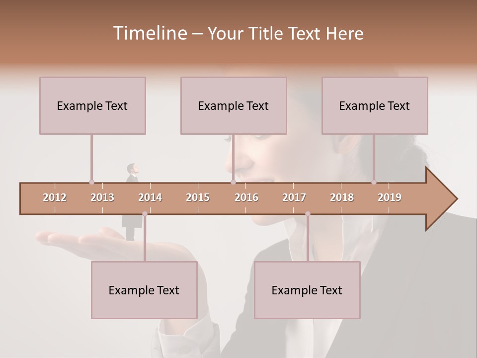 A Woman Holding A Small Toy In Her Hand PowerPoint Template