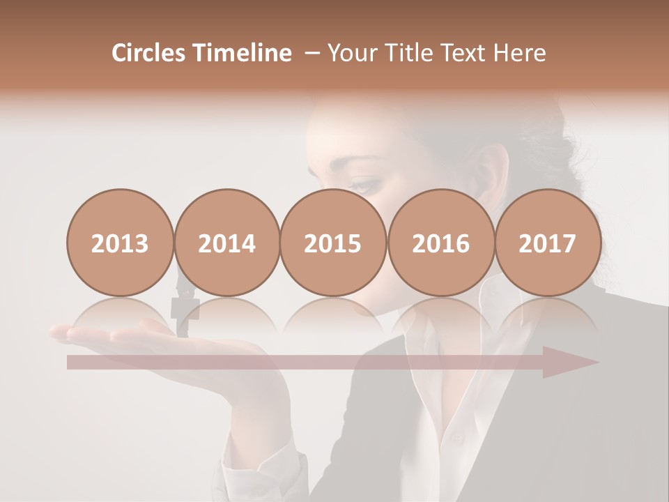 A Woman Holding A Small Toy In Her Hand PowerPoint Template