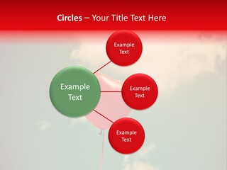 A Red Heart Shaped Balloon Floating In The Air PowerPoint Template