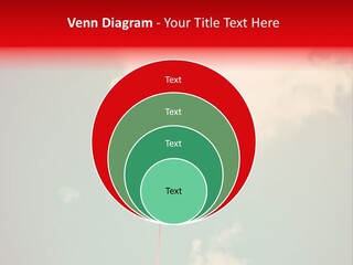 A Red Heart Shaped Balloon Floating In The Air PowerPoint Template