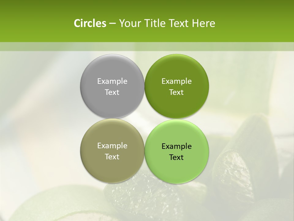 A Glass Filled With Green Liquid Next To Sliced Cucumbers PowerPoint Template