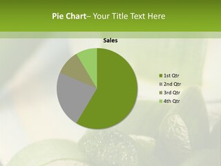 A Glass Filled With Green Liquid Next To Sliced Cucumbers PowerPoint Template