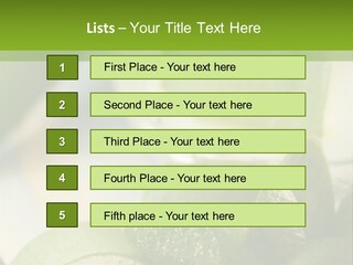 A Glass Filled With Green Liquid Next To Sliced Cucumbers PowerPoint Template