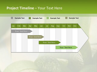 A Glass Filled With Green Liquid Next To Sliced Cucumbers PowerPoint Template