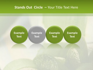 A Glass Filled With Green Liquid Next To Sliced Cucumbers PowerPoint Template