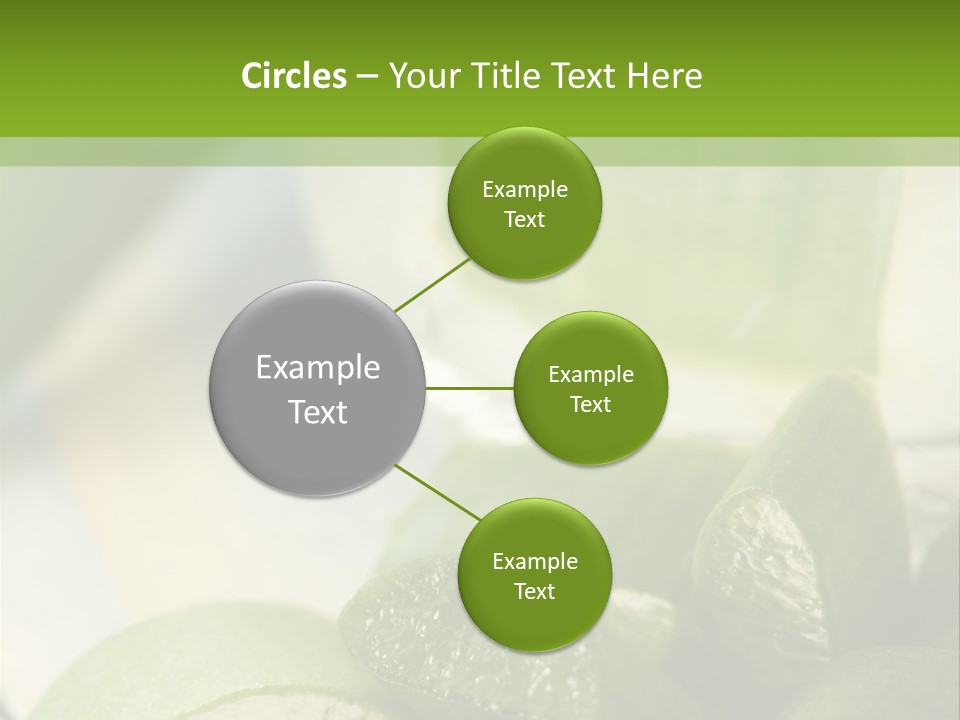 A Glass Filled With Green Liquid Next To Sliced Cucumbers PowerPoint Template