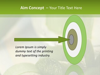 A Glass Filled With Green Liquid Next To Sliced Cucumbers PowerPoint Template