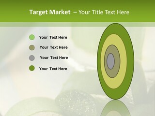 A Glass Filled With Green Liquid Next To Sliced Cucumbers PowerPoint Template