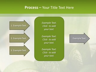 A Glass Filled With Green Liquid Next To Sliced Cucumbers PowerPoint Template