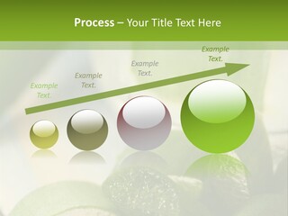 A Glass Filled With Green Liquid Next To Sliced Cucumbers PowerPoint Template